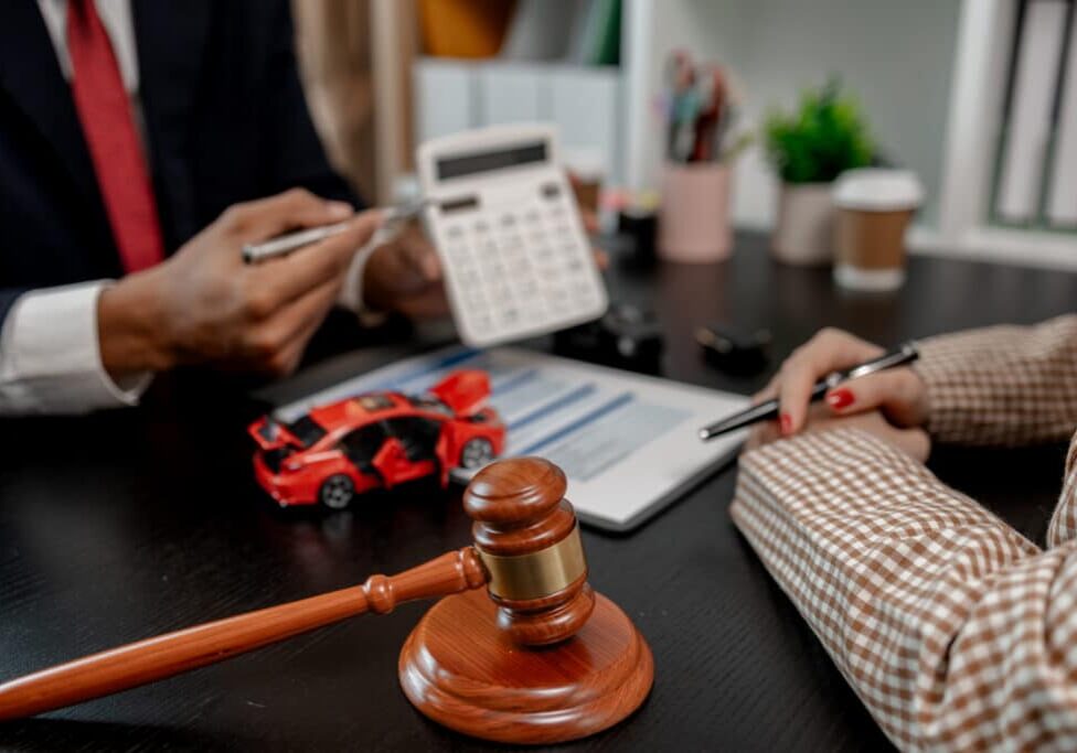 a lawyer is explaining the details of a car insura 2025 06 23 03 25 20 utc 2 1024x683 landscape ae50e2fb956e31ebda46e878cc89834c